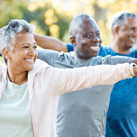 Adults smiling in workout class