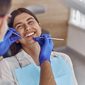 Woman smiling during dental checkup